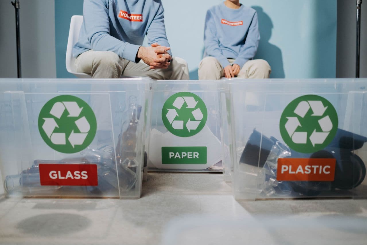 Recycling bins for paper, plastic, glass, and metal